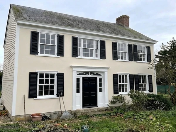 Colonial exterior in Behr Almond Wisp cream white, AI color preview