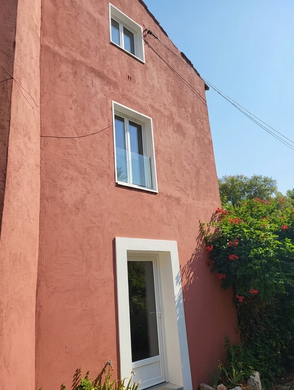 Façade en Corail après simulation couleur (IA)