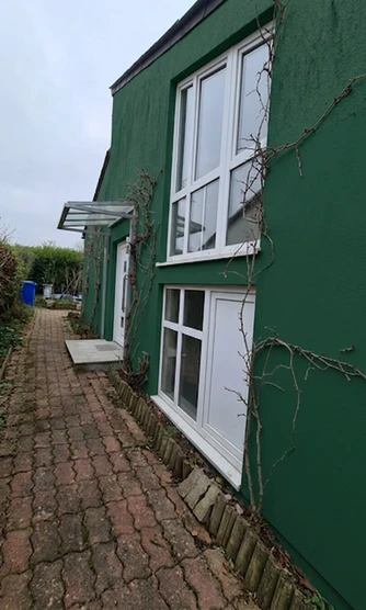 Façade en Vert Fonce après simulation couleur (IA)