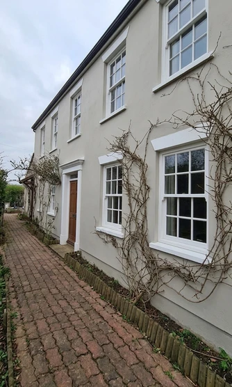 House facade in Repose Gray (Sherwin-Williams SW 7015) after AI colour preview