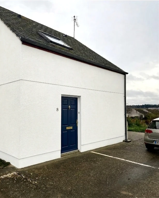 Front entry door in navy blue, AI color preview on light exterior